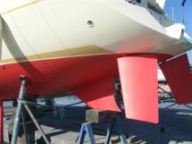 Hull double rudder